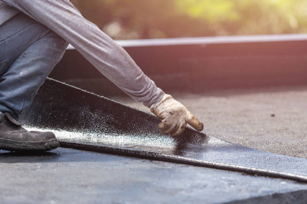 Professional Waterproofing technician working in Milford, IN